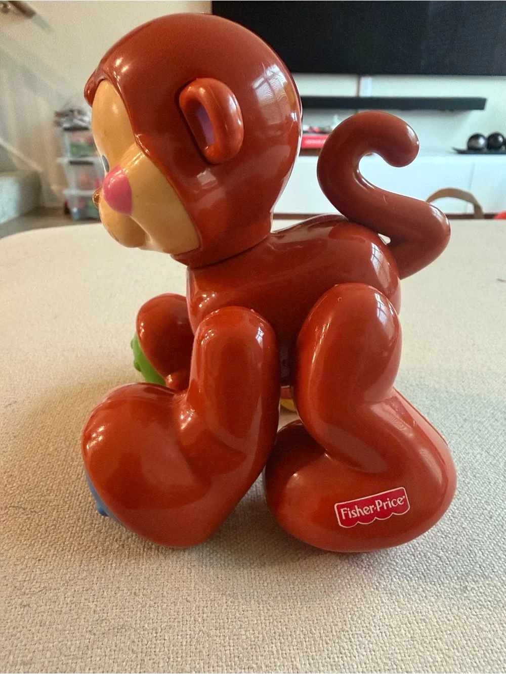 Fisher-Price Red Monkey Push Toy with Blue and Green Rollers